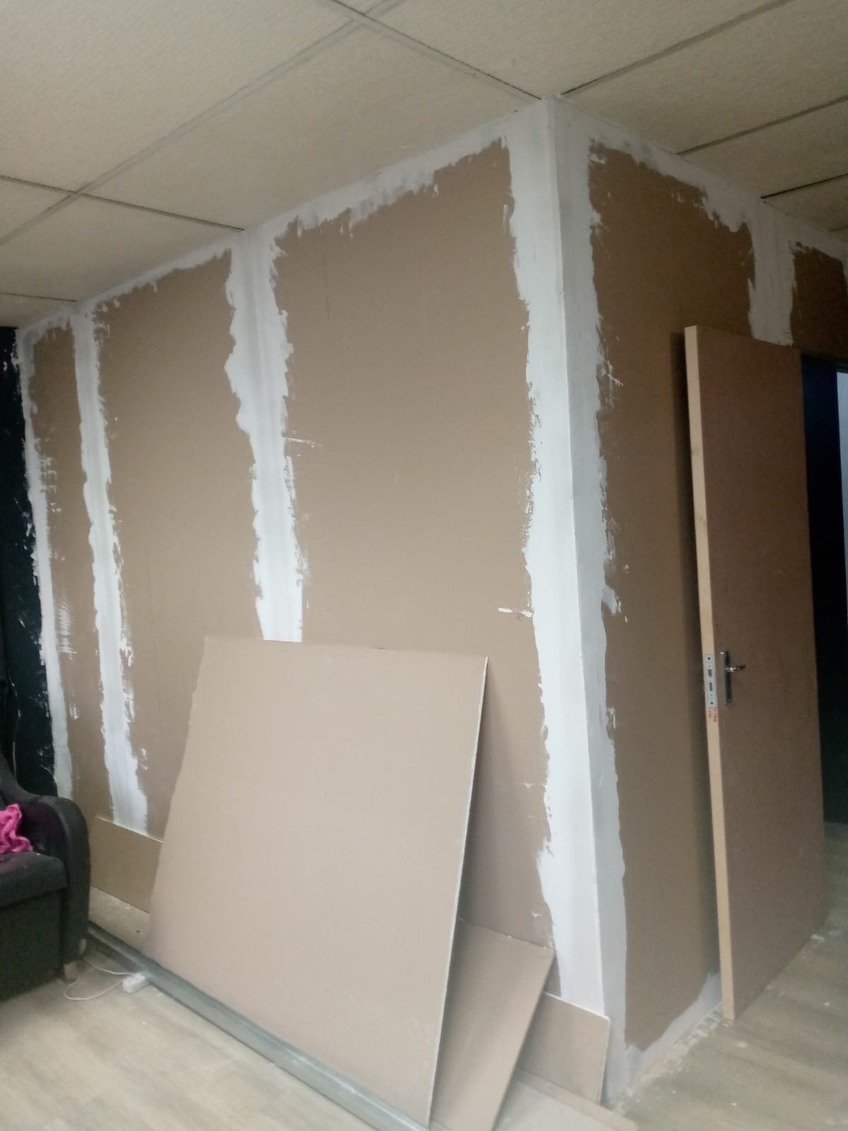 Drywall partitioning prepped for painting in a Pretoria office